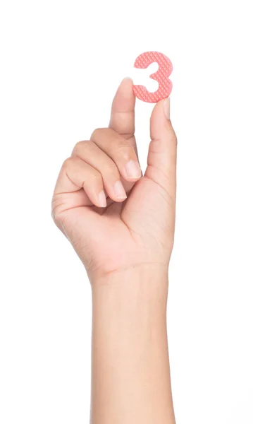 Hand holding number made from EVA foam isolated on white backgro — ストック写真