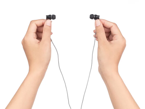 Hand holding Earphones isolated on a white background — 图库照片