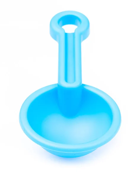 Pequeña pala de juguete de plástico aislada sobre un fondo blanco. — Foto de Stock