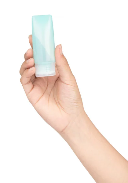 Hand houden van kleine plastic fles van hygiëneproducten geïsoleerd — Stockfoto