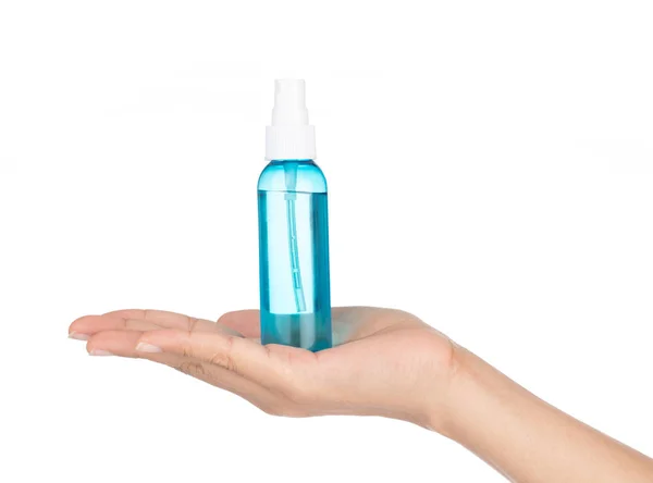 Hand Holding Spray fles geïsoleerd op witte achtergrond. — Stockfoto