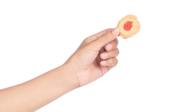 Hand holding cookies with jam strawberry isolated on white backg — Stock Photo, Image