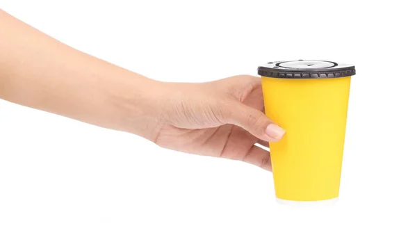 Trzymanie ręki Paper filiżanka kawy izolowane na białym tle — Zdjęcie stockowe