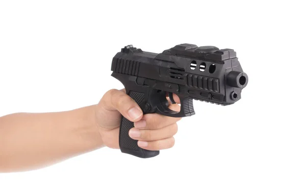 Ручная игра с игрушечным пистолетом на белом фоне — стоковое фото