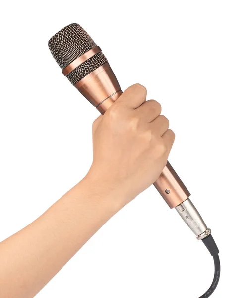 Mano sosteniendo micrófono dorado aislado sobre fondo blanco — Foto de Stock