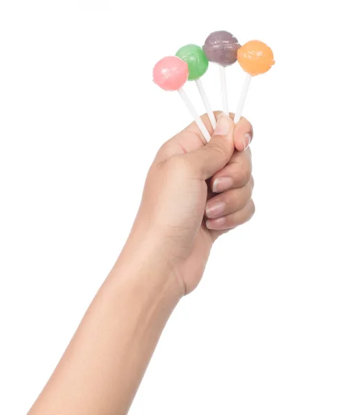 Hand holding lollipop candy isolated on white background — 图库照片