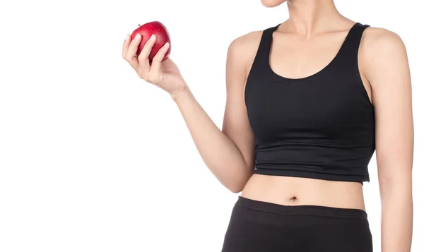 Jeune femme mince tenant une pomme rouge. Isolé sur fond blanc — Photo