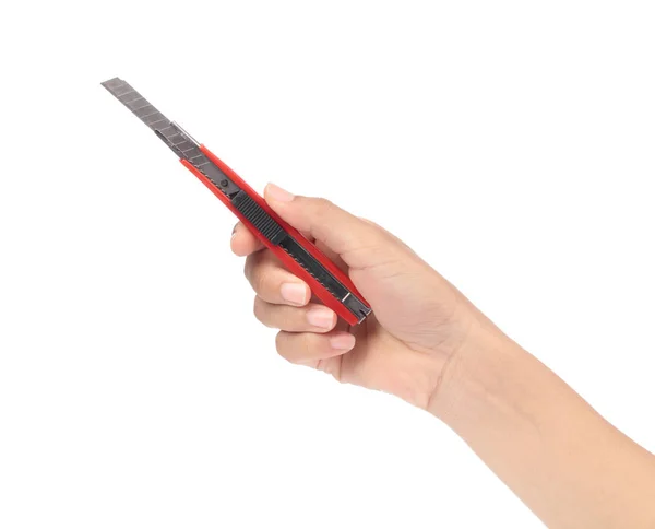 Mão segurando faca cortador vermelho isolado no fundo branco — Fotografia de Stock