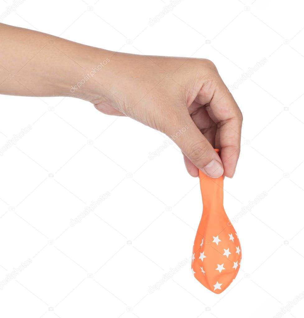hand holding Deflated balloon isolated on white background
