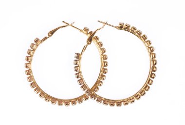 Beautiful golden earring with diamond isolatted on white backgro