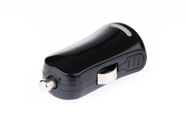 Black USB electronics device car charger isolated on white backg