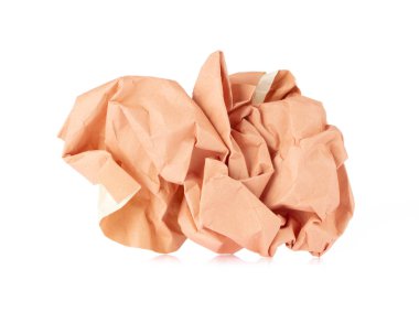 Crumpled up piece nude color of Paper isolated on white backgrou