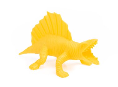 Beyaz arka planda izole edilmiş dinozor oyuncağı