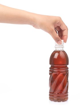hand opening bottle of tea isolated on white background