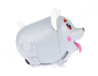 clockwork plastic toy isolated on white background