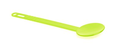 green plastic kitchen utensil isolated on a white background