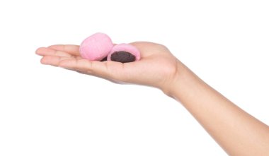 hand holding Daifuku cake isolated on white background