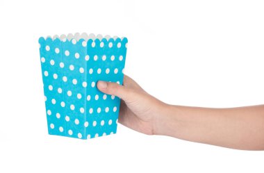 Hand holding Popcorn paper box isolated on white background