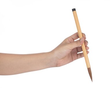 Hand holding A Paint Brush isolated on white background