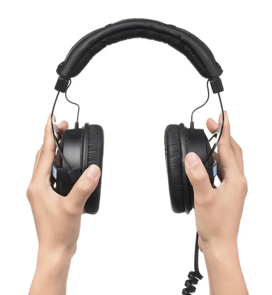 Hand hält Kopfhörer isoliert auf weißem Hintergrund — Stockfoto