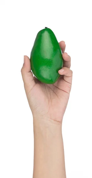 Hand haltend Avocado zur Dekoration künstlicher Obstschmuck a — Stockfoto