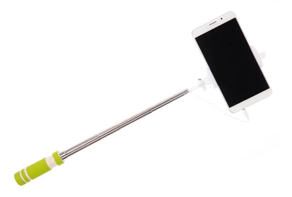 Palo selfie con teléfono móvil aislado sobre un fondo blanco — Foto de Stock