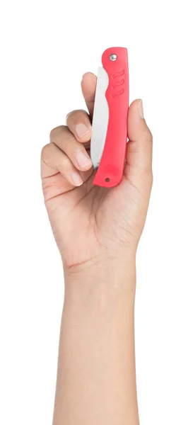 Hand holding knife with red plastic handle isolated on a white b — Stock fotografie