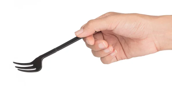 Κράτημα χεριού Μαύρο πιρούνι απομονωμένο σε λευκό φόντο. — Φωτογραφία Αρχείου