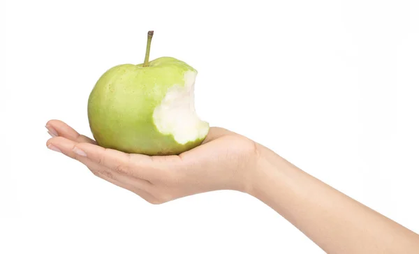 Hand holding bite of guava fruit isolated on white background — ストック写真