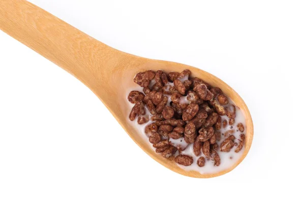 Sendok kayu cokelat sereal dengan susu terisolasi pada backg putih — Stok Foto