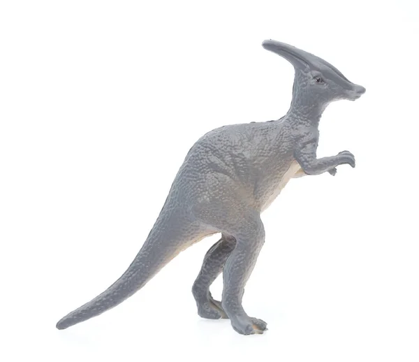 Игрушечный динозавр на белом фоне — стоковое фото