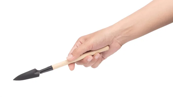 Рука держа стальную лопату с деревянной ручкой изолированы на whi — стоковое фото