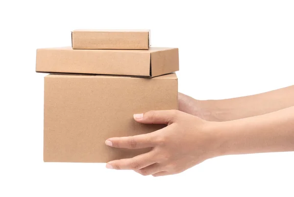 Hand hält Kisten gestapelt auf weißem Hintergrund. — Stockfoto