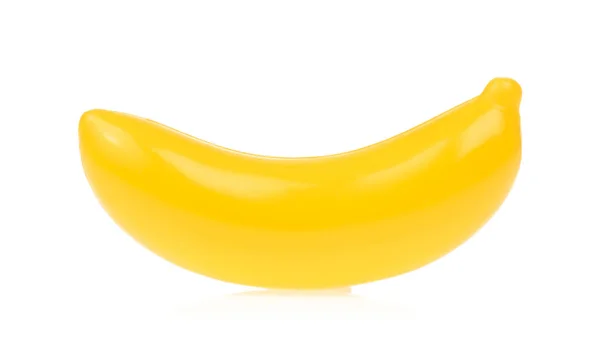 Пластмасса банановых фруктов на белом фоне — стоковое фото