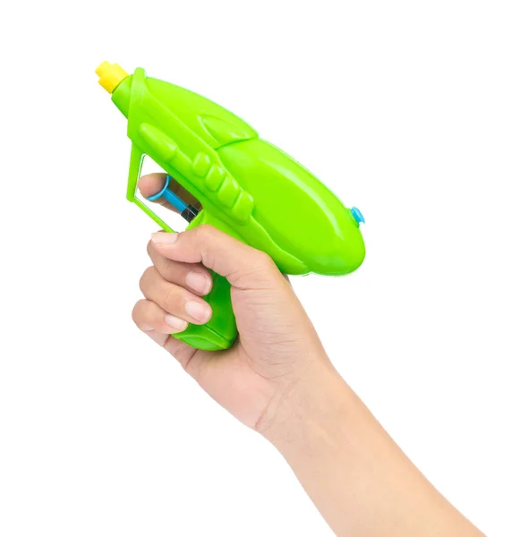 Mano tenendo giocattolo pistola ad acqua di plastica isolato su sfondo bianco — Foto Stock