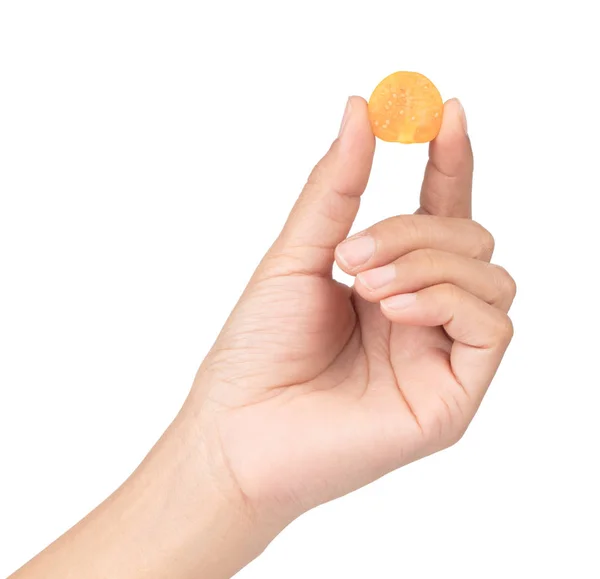 Hand holding Cape gooseberry isolated on white background — Stockfoto