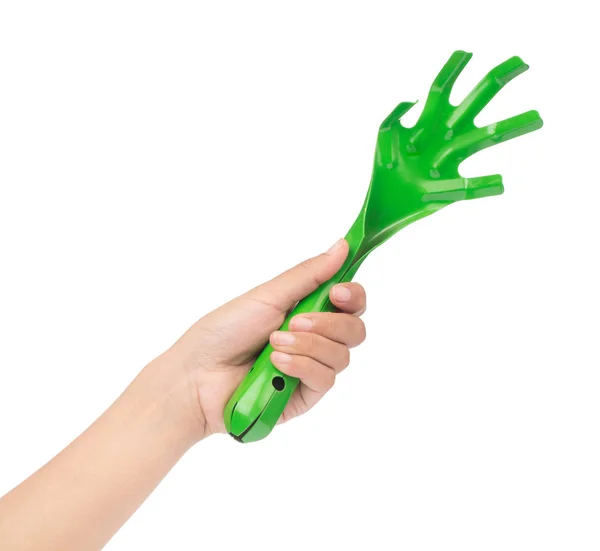 Hand håller Green Garden rake isolerad på vit bakgrund — Stockfoto