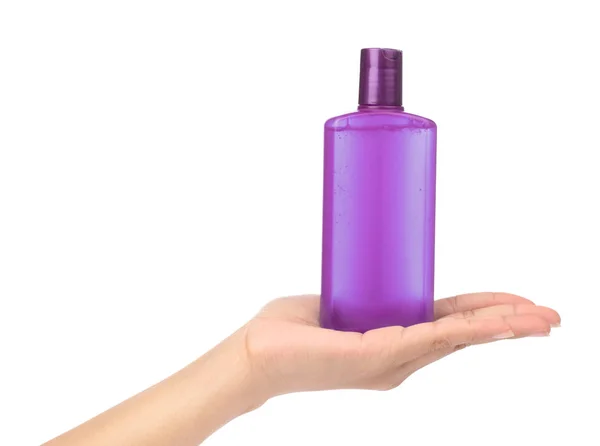 Hand holding a bottle product cosmetic for skincare isolated on — Stock Photo, Image