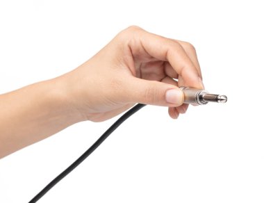 hand holding Audio jack connection of microphone isolated on whi