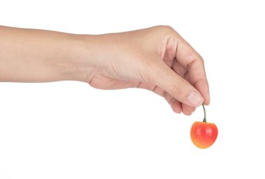 Hand holding Cherry for decoration artificial fruit ornaments ar