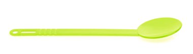 green plastic kitchen utensil isolated on a white background