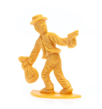 plastic toy cowboy isolated on white background