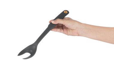 Hand holding Silicone Kitchen Fork long handle isolated on white