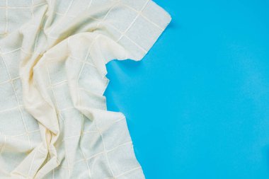 White tablecloth on blue background