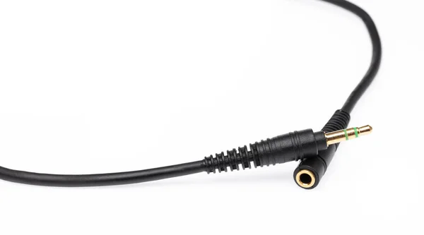 Audio jack met kabel geïsoleerd op witte achtergrond. — Stockfoto