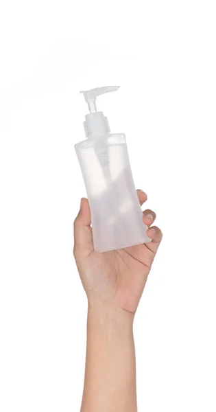 Mão segurando cabeça bomba de garrafa de plástico isolado no backgrou branco — Fotografia de Stock