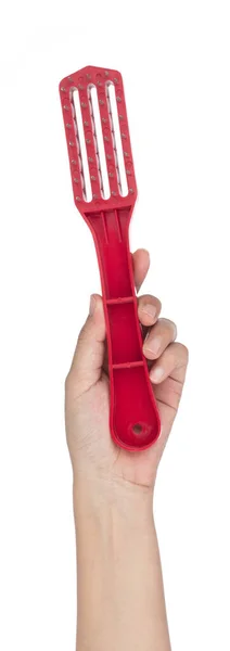 Hand holding plastic Fish Scale Cleaner Kitchen Tool isolated on — 스톡 사진