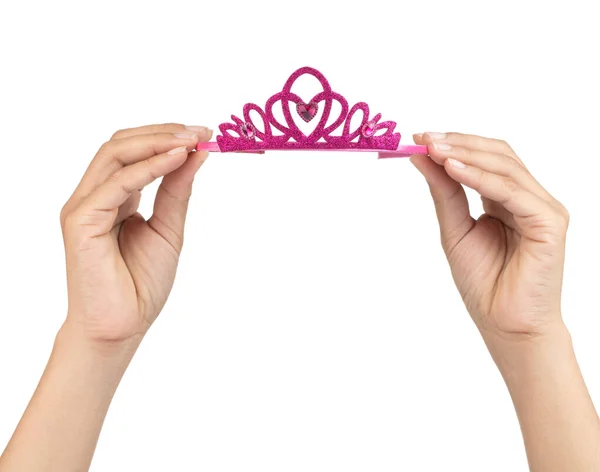 Hand holding Crown of a princess isolated on white background — Stock Photo, Image