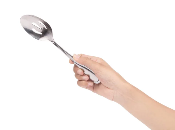 Hand holding stainless spoon isolated on white background — Stok fotoğraf