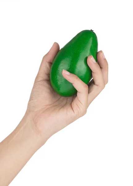 Hand holding Avocado for decoration artificial fruit ornaments a — Stok fotoğraf